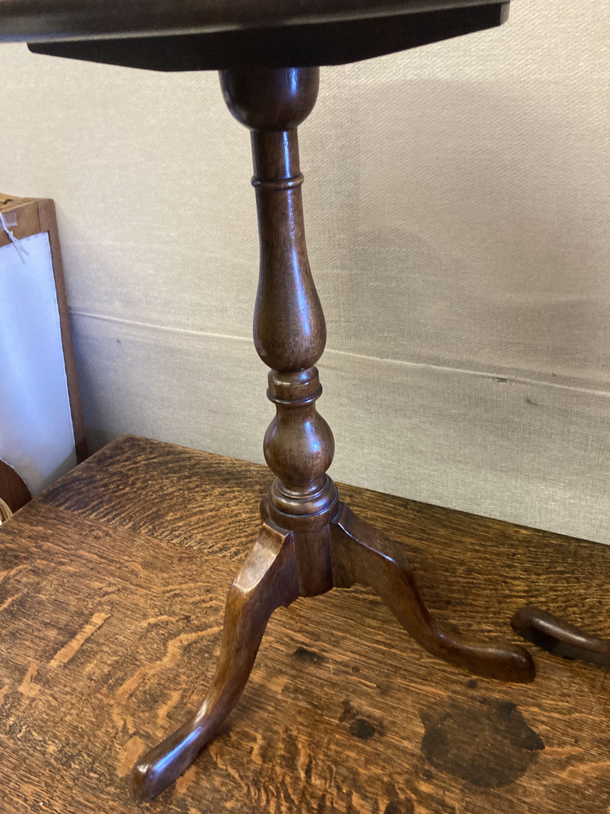 Two reproduction mahogany tripod wine tables, larger 38cm diameter, height 54cm